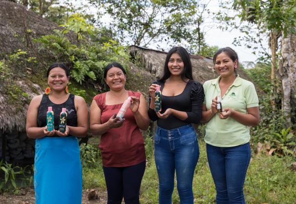 Photo: Entrepreneurial women from “Bio Warmi,” a business producing natural cosmetics based on medicinal plants, including soaps, shampoos, conditioners, essential oils, and ancestral medicine. Credit: CONAFIPS